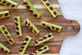 Homemade ants on a log with celery, peanut butter and raisins on a wooden board, top view. Royalty Free Stock Photo