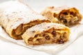 Homemade apfelstrudel, Apple strudel with raisins and mint on light background. view from above, Food recipe background, austrian Royalty Free Stock Photo