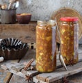 Homemade Apple Jam with Cinnamon. Pieces of apples in caramel syrup for baking pie. Autumn canning and preserving. Conservation of Royalty Free Stock Photo