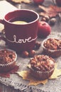 Homemade apple muffins and cup of tea with lemon, autumn mood Royalty Free Stock Photo