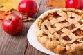 Homemade apple pie, apples and autumn leaves Royalty Free Stock Photo