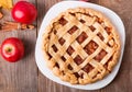 Homemade apple pie, apples and autumn leaves Royalty Free Stock Photo