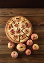 Homemade apple pie with cream filling served with raw organic ap Royalty Free Stock Photo