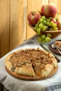 Homemade apple pie with streusel and fresh fruit. Rustic style