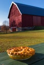 Homemade Apple Pie on a wooden picnic table