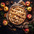 A Homemade apple pies on rustic background and apples, classic dessert for Thanksgiving, top view,