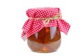 Homemade apricot jam in glass jar isolated on white Royalty Free Stock Photo