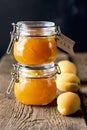 Homemade Apricot Jam in Jars and Fresh Fruits Apricot Old Wooden Background Dark Photo Vertical Royalty Free Stock Photo