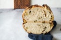 Homemade artisanal sourdough bread with olives. Healthy home baking and artisanal bread concept