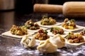 Homemade Asian dumplings with vegetable filling on a black granite table, Chinese dumplings for dinner. Japanese dumplings for