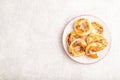 Homemade asian salted cookies on gray concrete, top view, copy space