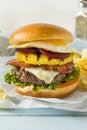 Homemade Aussie Pineapple and Beet Cheeseburger Royalty Free Stock Photo