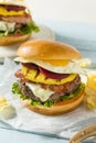 Homemade Aussie Pineapple and Beet Cheeseburger Royalty Free Stock Photo