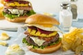 Homemade Aussie Pineapple and Beet Cheeseburger Royalty Free Stock Photo