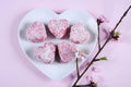 Homemade Australian style pink heart shape small lamington cakes