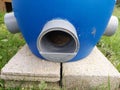 homemade automatic feeder for chickens. feeding the roosters in the chicken coop in the backyard garden