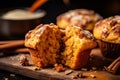 Homemade Autumn Pumpkin Spice Muffins with Pecan nuts. Fall and winter baking. Old rustic wooden background