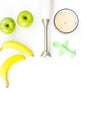 Homemade baby food. Cook puree with apple and banana with immersion blender. White background with toy top view space Royalty Free Stock Photo