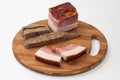 Homemade bacon and liverwurst on board Royalty Free Stock Photo