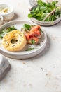 Homemade bagel sandwich with smoked salmon, cream cheese, capers and spinach for healthy breakfast text space Royalty Free Stock Photo