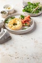 Homemade bagel sandwich with smoked salmon, cream cheese, capers and spinach for healthy breakfast text space Royalty Free Stock Photo