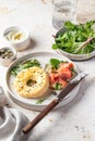 Homemade bagel sandwich with smoked salmon, cream cheese, capers and spinach for healthy breakfast Royalty Free Stock Photo