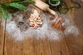 Homemade baked Christmas gingerbread tree on vintage wooden back