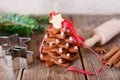 Homemade baked Christmas gingerbread tree on vintage wooden back