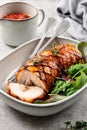 Homemade baked porchetta in rolls with several herbs, pepper and garlic Royalty Free Stock Photo