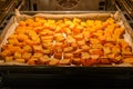 Homemade baked pumpkin on a baking pan in the oven. Healthy eating Royalty Free Stock Photo