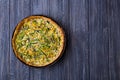 Homemade baked zucchini quiche lorraine with eggs, milk and cumin