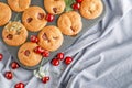 Homemade baking. Cupcakes with cherries.Dessert decorates with fresh berries and leaves. Wooden background. Food styling Royalty Free Stock Photo