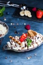 Homemade Banana Split with ice cream and chocolate.