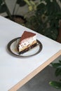 Homemade Banoffee Cake with caramel sauce, bananas and whipped cream on white table. Royalty Free Stock Photo