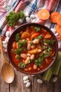 Homemade bean soup, carrots and celery close-up. vertical top vi