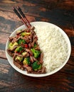 Homemade Beef and Broccoli with Rice on wooden table Royalty Free Stock Photo