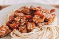 Homemade Beef Spaghetti with sauce served on dish.