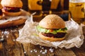 Homemade Beefburger on Table. Royalty Free Stock Photo