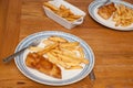 Homemade beer battered fish and chips for 2 Royalty Free Stock Photo