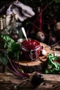 Homemade beet ketchup in a glass jar. Rustic style Royalty Free Stock Photo