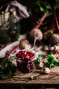 Homemade beet ketchup in a glass jar. Rustic style Royalty Free Stock Photo