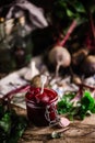 Homemade beet ketchup in a glass jar. Rustic style Royalty Free Stock Photo