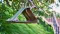 homemade birdhouse. general plan. color nature. day light