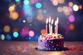 A homemade birthday cake adorned with candles with bokeh background and space for text