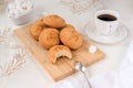 Homemade biscuit cookies on a bamboo board, a cup of coffee, refined sugar - still life Royalty Free Stock Photo