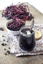 Homemade black elderberry syrup in glass jar Royalty Free Stock Photo