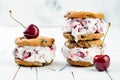 Homemade Black Forest roasted cherry ice cream sandwiches with chocolate chip cookies. Royalty Free Stock Photo