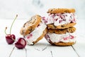 Homemade Black Forest roasted cherry ice cream sandwiches with chocolate chip cookies. Royalty Free Stock Photo