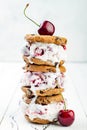 Homemade Black Forest roasted cherry ice cream sandwiches with chocolate chip cookies. Royalty Free Stock Photo