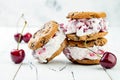 Homemade Black Forest roasted cherry ice cream sandwiches with chocolate chip cookies. Royalty Free Stock Photo